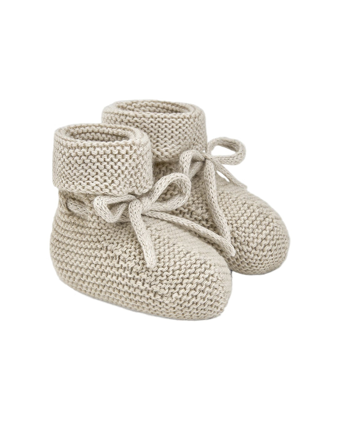 knit baby booties in beige