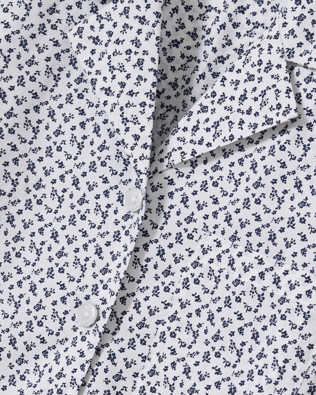 close up photo of ditsy floral print fabric