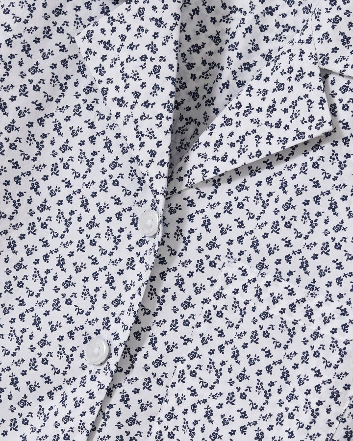 close up photo of ditsy floral print fabric