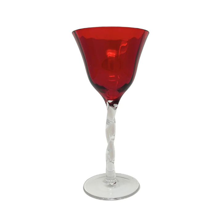 Red wine glass with a clear stem on a white background
