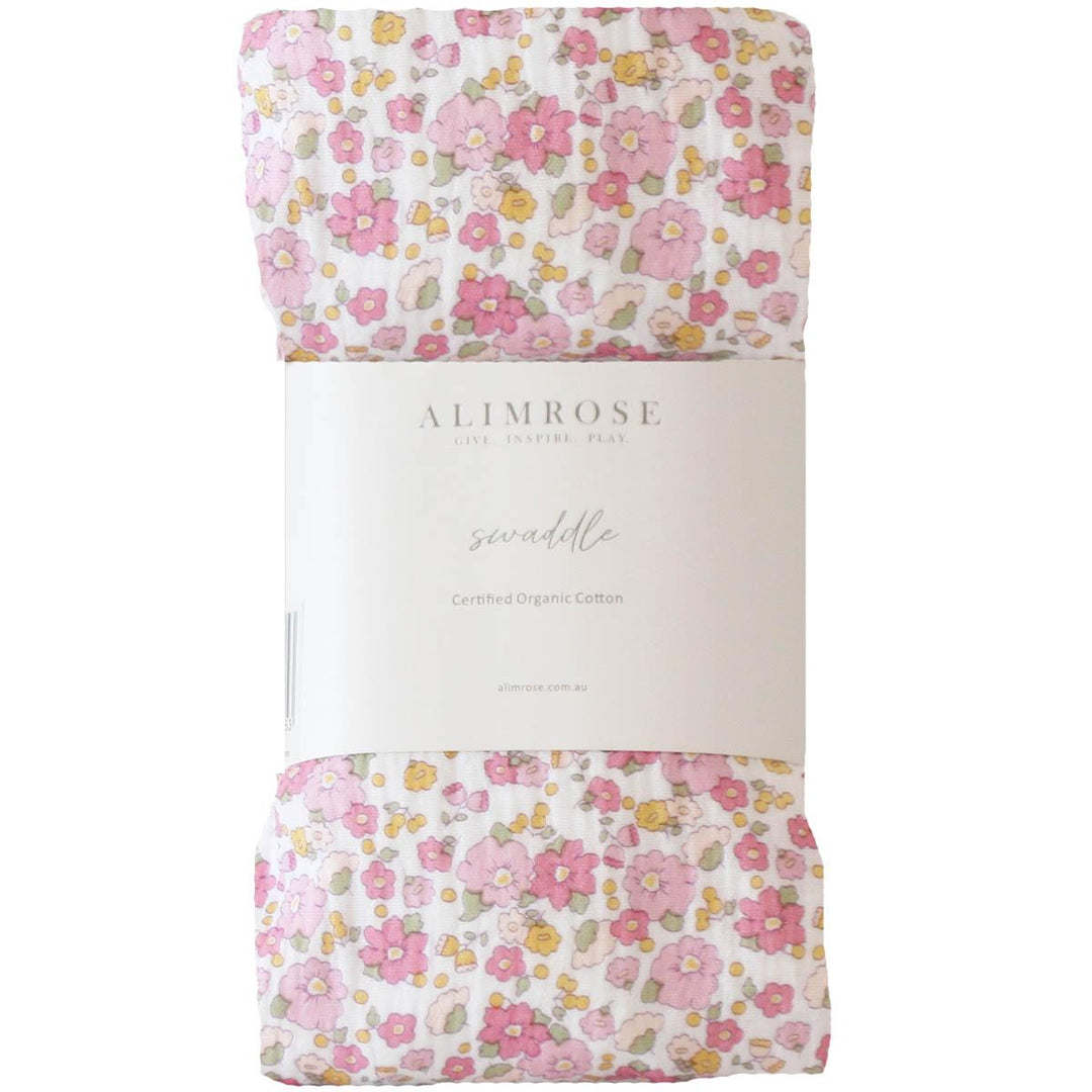 Floral swaddle blanket with 'Alimrose' branding on a white background