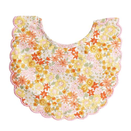 Floral-patterned bib on a white background