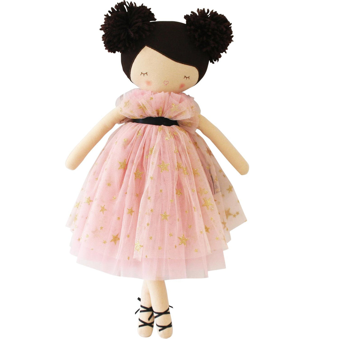 Doll with a pink dress featuring gold stars on a white background