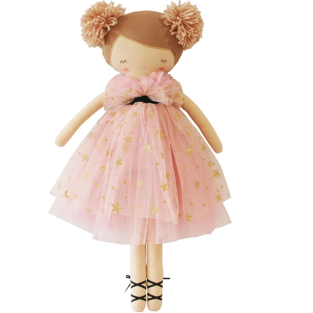 Stuffed doll with a pink dress featuring gold stars on a white background