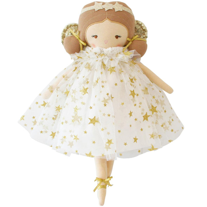 Doll with a white dress featuring gold stars on a white background