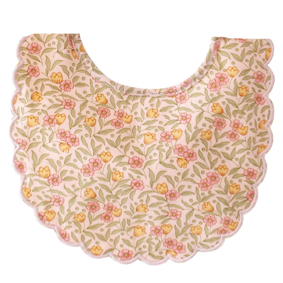 Floral patterned baby bib on a white background