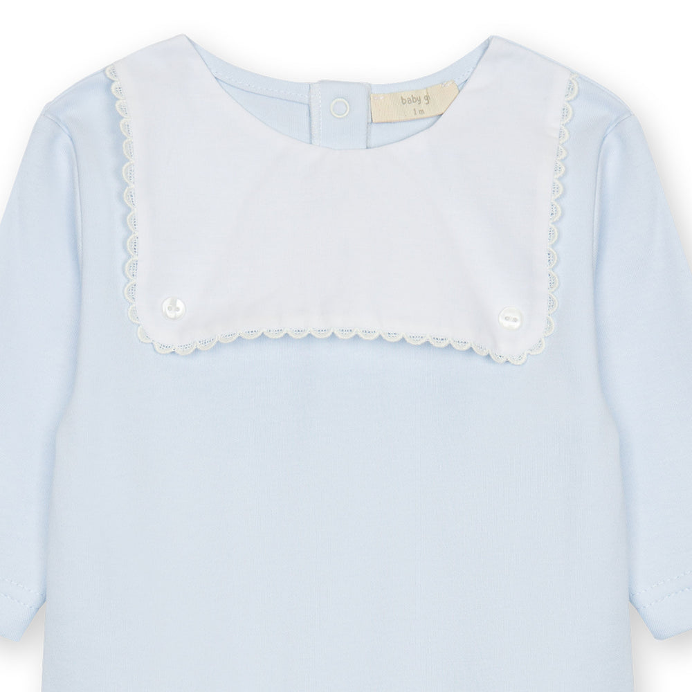 Close up of White Baby Blue Footie with White Bib and Trim 