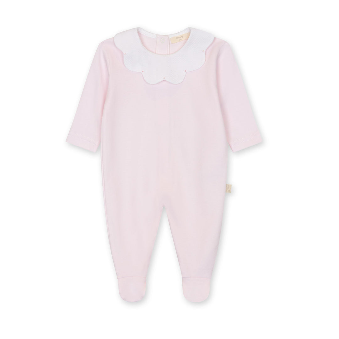 Pink baby onesie with a white collar on a white background
