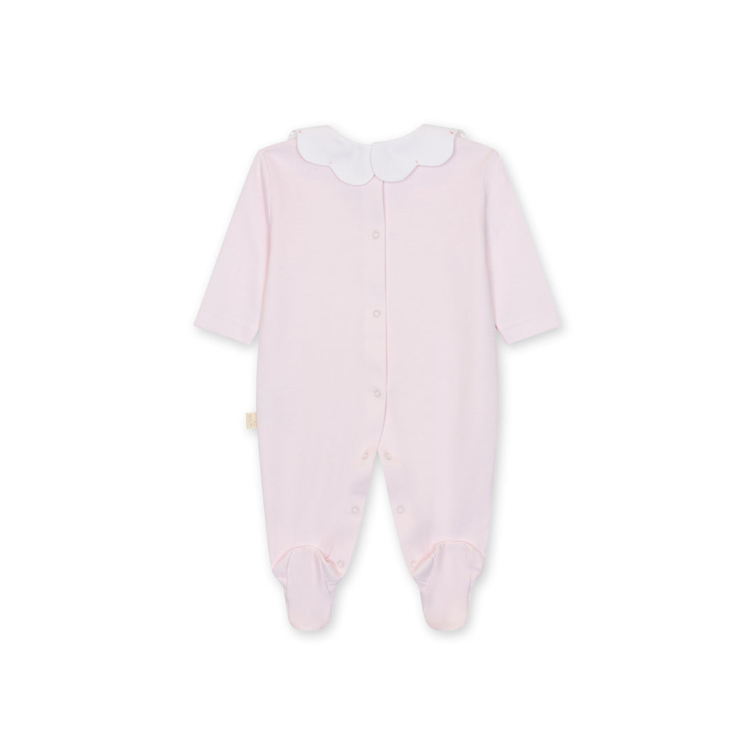 Pink baby onesie with a white collar on a white background