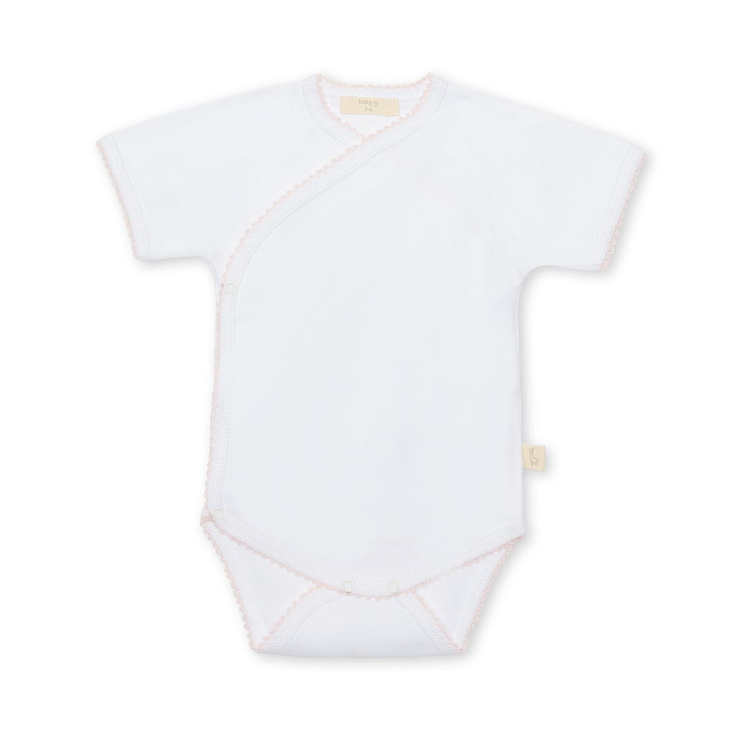 white with pink trim baby onesie on white background