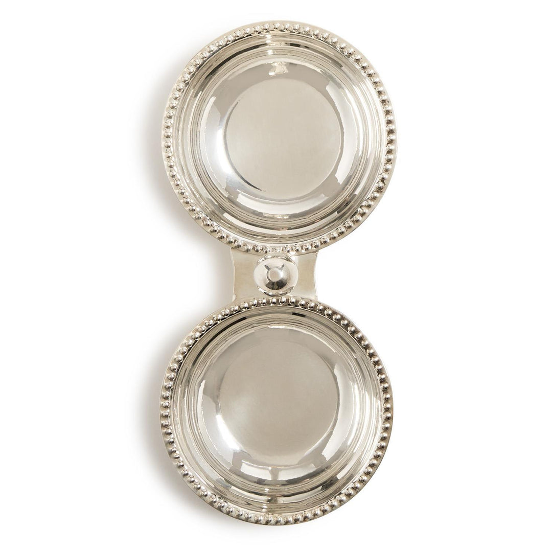 Two silver circular dishes with beaded edges on a white background