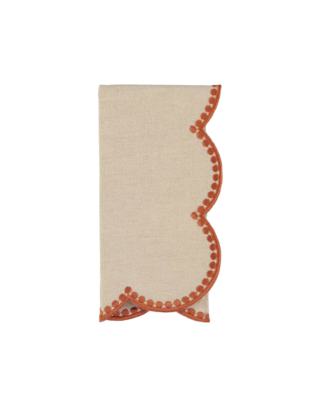 Beige napkin with orange pom-pom trim on a white background