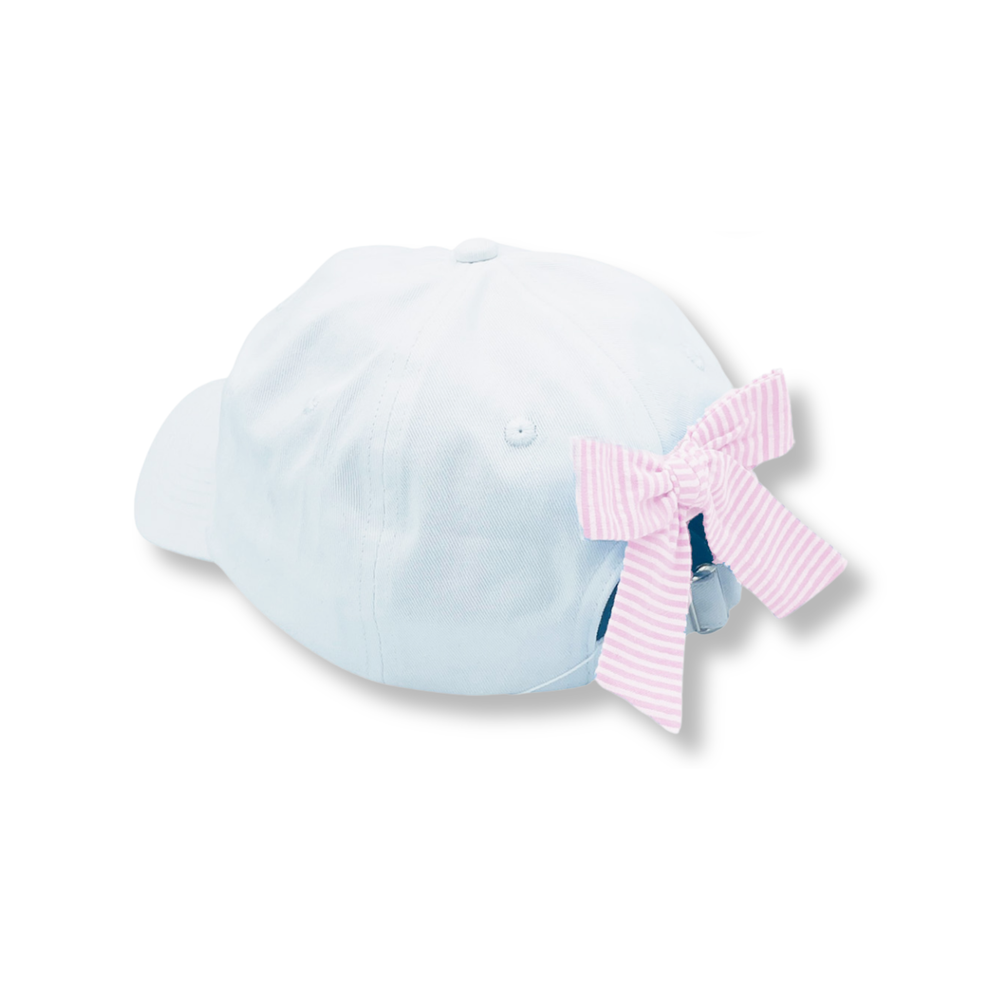 White cap with pink bow on back