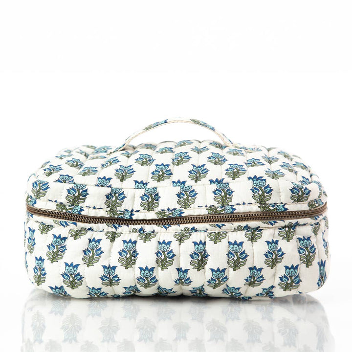 Floral-patterned travel case on a white background