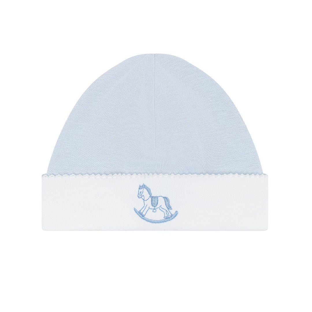 Light blue baby hat with a white band featuring a rocking horse emblem on a white background