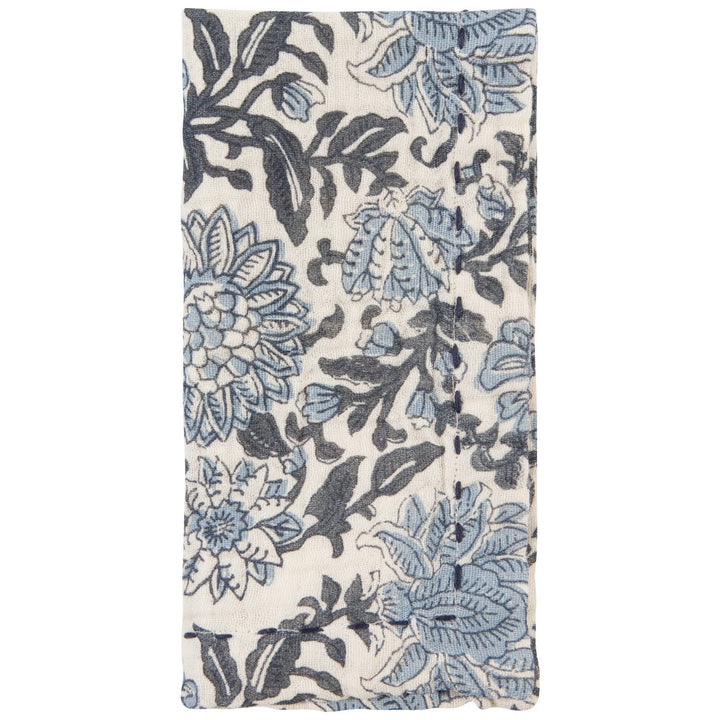 Floral patterned fabric with blue and black flowers on a white background
