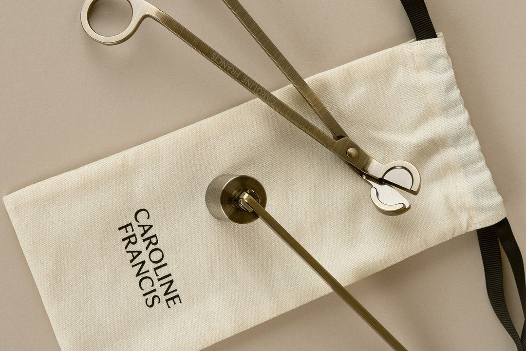 Caroline Francis Candle Snuffer Set on a logo twill bag