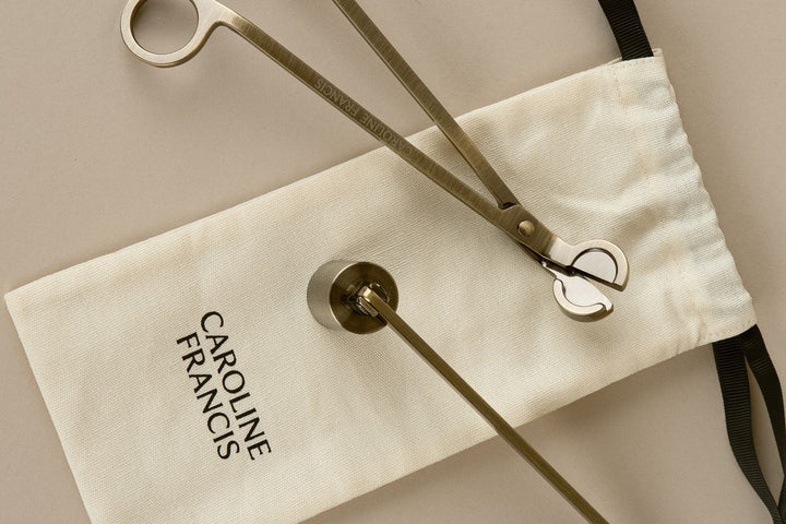 Caroline Francis Candle Snuffer Set on a logo twill bag