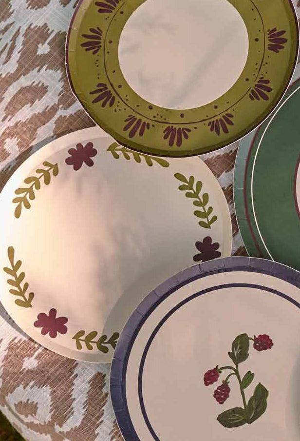 Table Two Studio paper plate collection including the Casa Dinner plate in creme, styled in a lifestyle tablescape