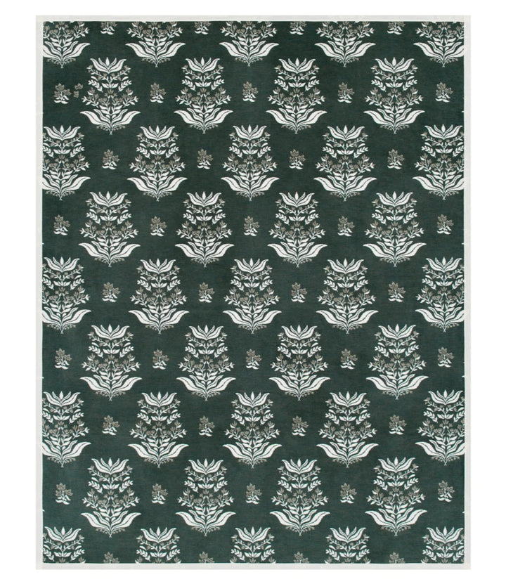 A square area rug featuring a repeating damask-style floral pattern in dark forest green and off-white, framed by a thin off-white border.