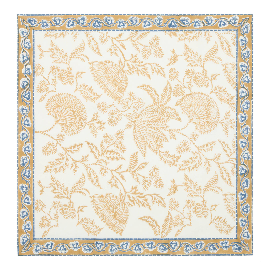Floral patterned rug with decorative border on a white background