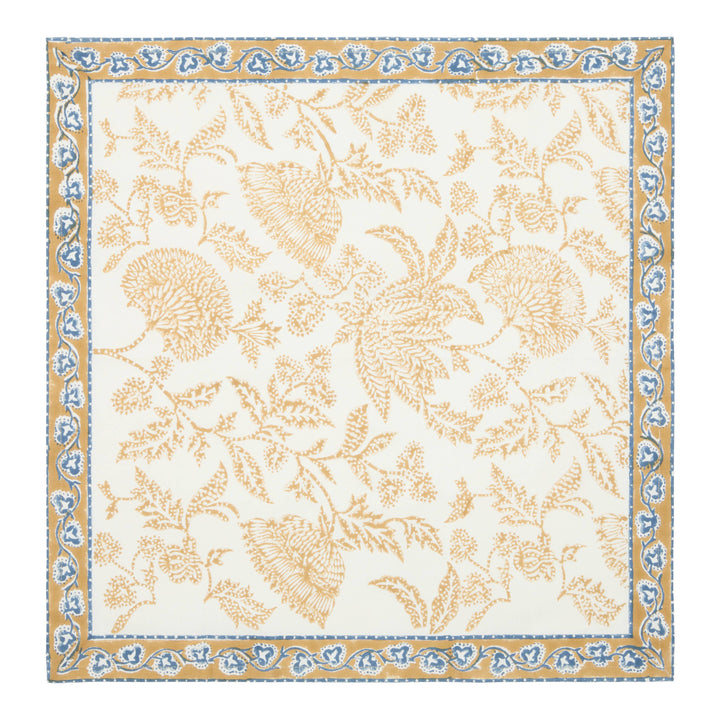 Floral patterned rug with decorative border on a white background