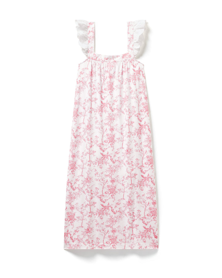 Pink floral dress with white straps on a white background
