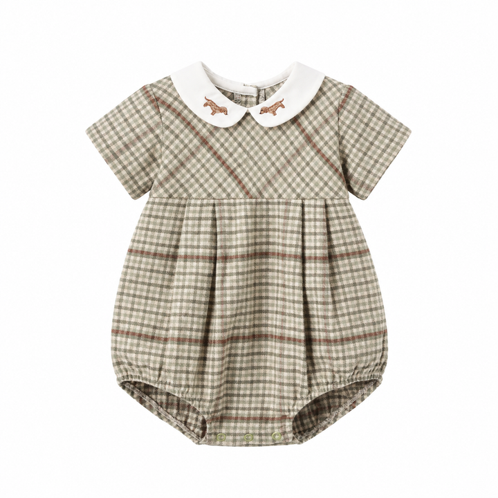 A baby romper in a beige and brown plaid pattern with a white Peter Pan collar featuring embroidered brown horse details, shown on a plain white background.