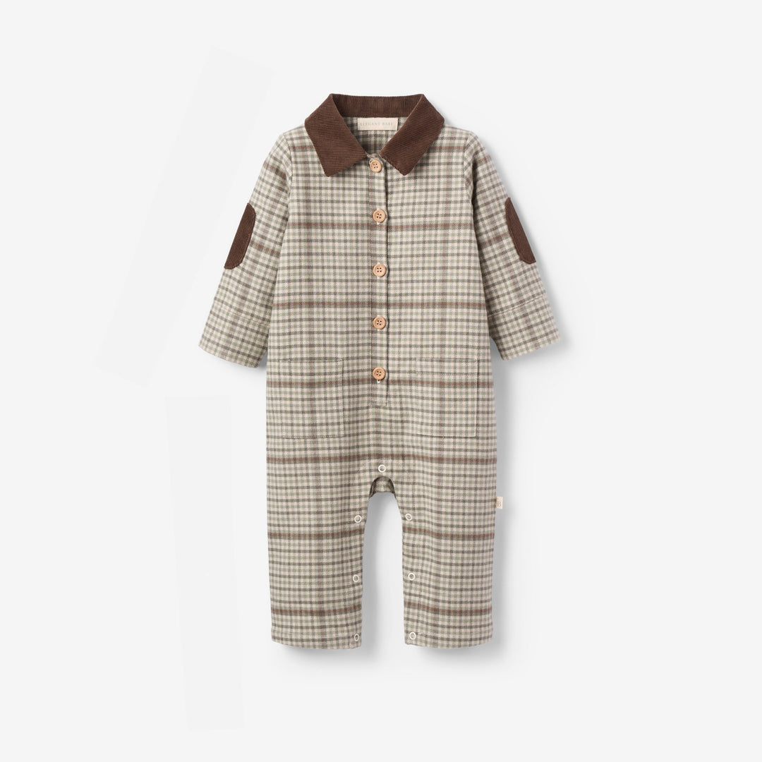 Plaid baby romper with brown accents on a white background