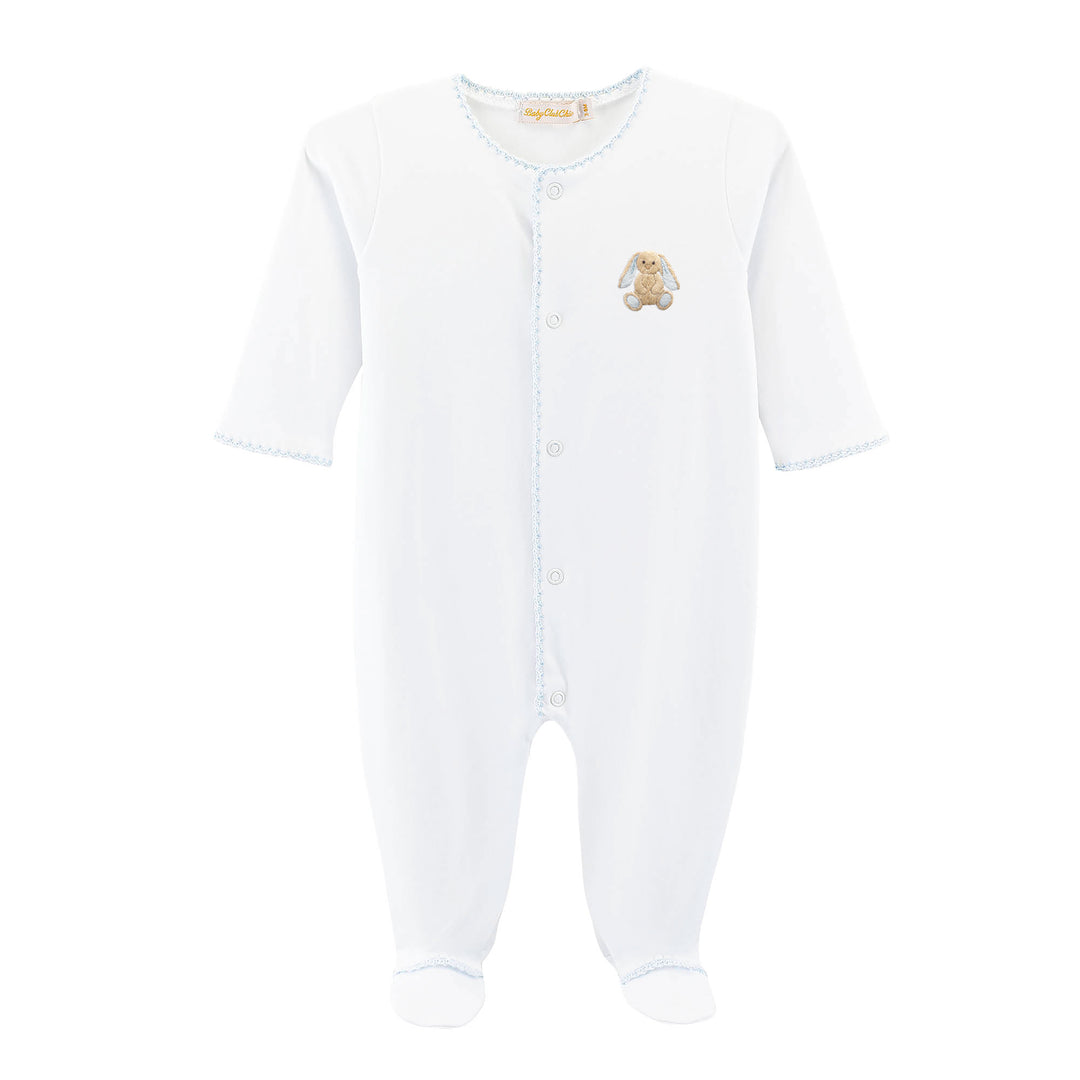A white long-sleeve baby footed sleeper with a button front, featuring a small embroidered bunny on the chest and light blue scalloped trim.