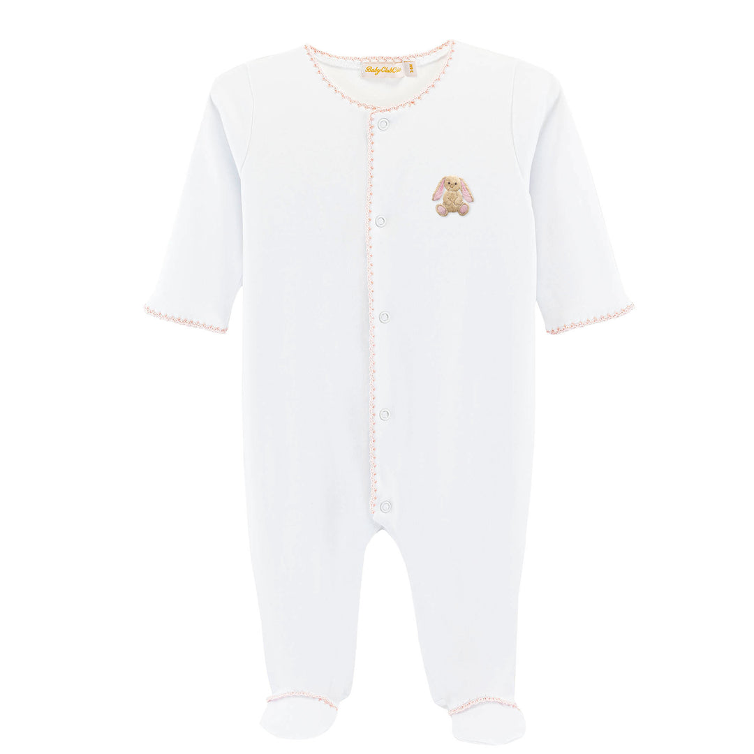 White baby onesie with a small embroidered design on a white background