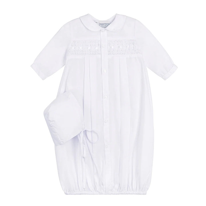 A white baby christening gown with short sleeves, a Peter Pan collar, and delicate lace embroidery across the chest, shown with a matching bonnet on a plain white background.