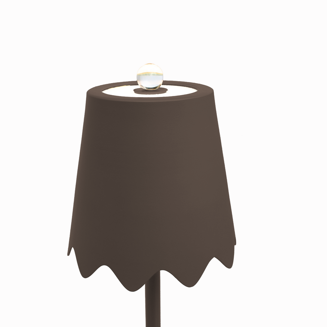 Brown round table with a glass on a white background