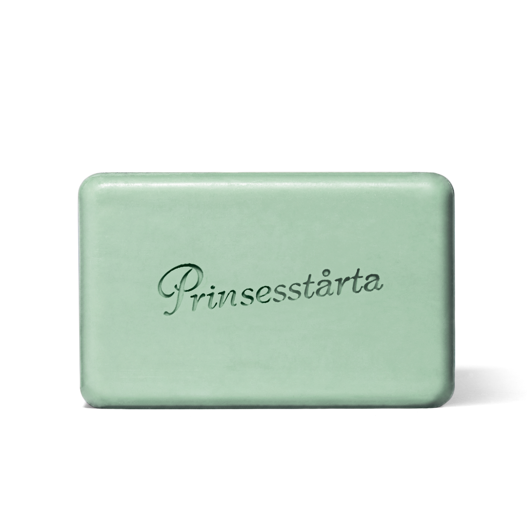 Green soap bar with 'Prinsesstärta' branding on a white background
