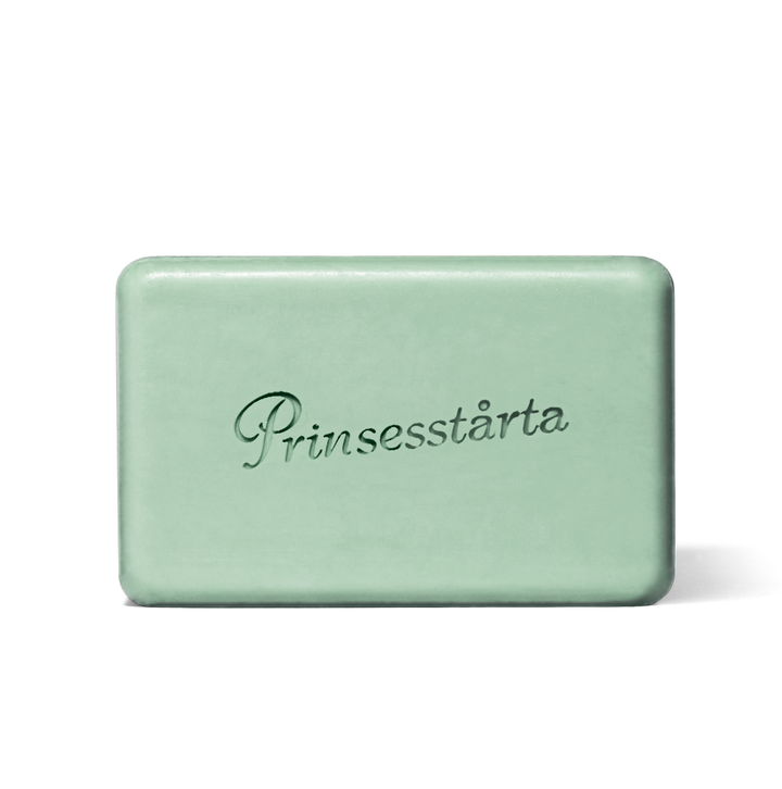 Green soap bar with 'Prinsesstärta' branding on a white background