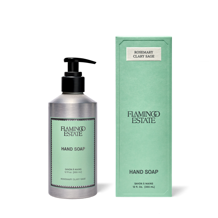 Flamingo Estate Jasmine Damask Rose hand soap in a silver pump bottle next to its mint green packaging box, on a white background.