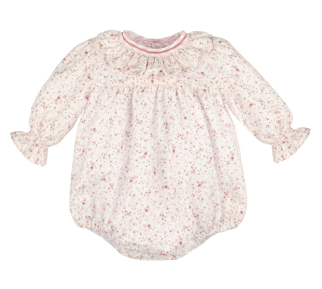 Floral baby romper on a white background