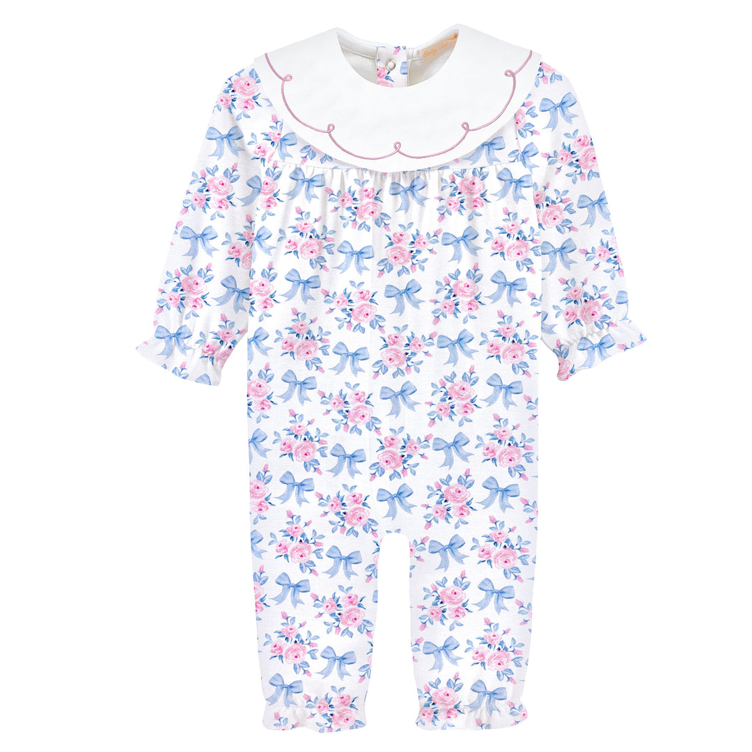 baby girls playsuit in a floral and bow print pattern