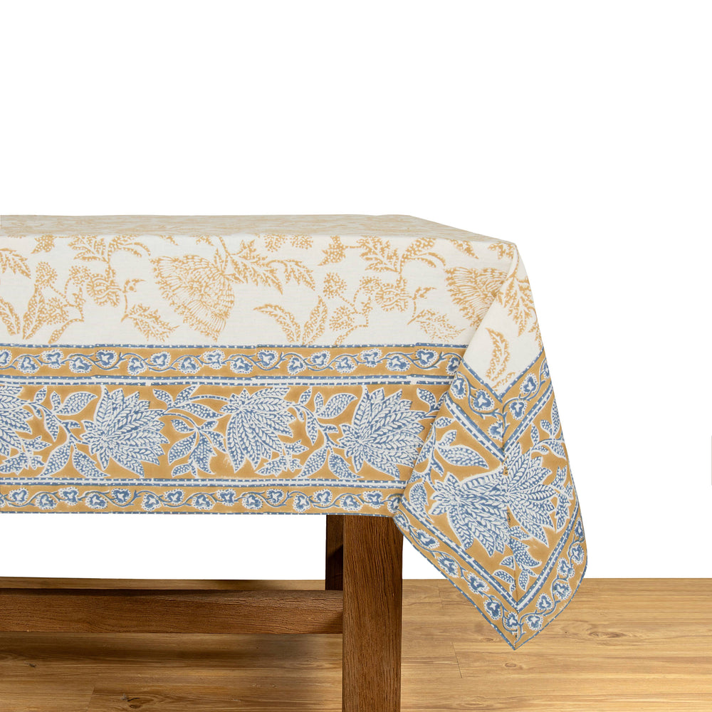 Tablecloth with floral pattern on a wooden table