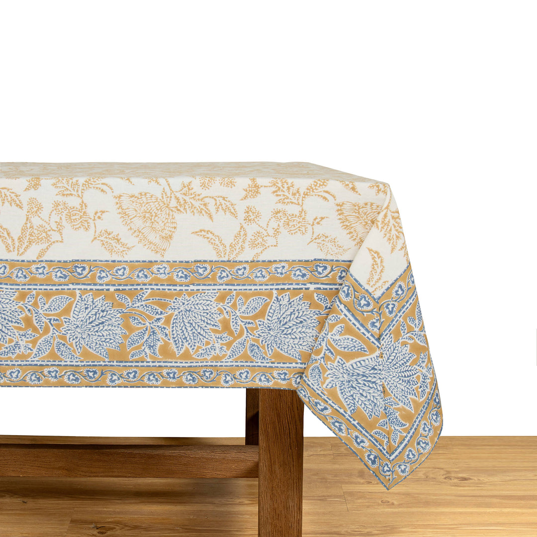 Tablecloth with floral pattern on a wooden table