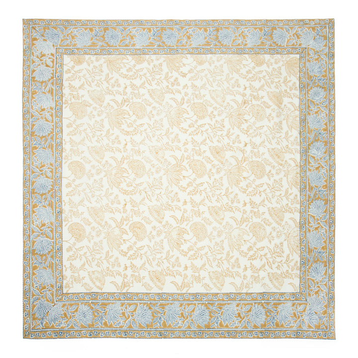 Decorative rug with a floral border on a beige background