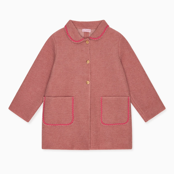 A dusty rose pink children's jacket with a Peter Pan collar, button closure, and two front patch pockets, all outlined with contrasting pink piping, shown on a plain white background.