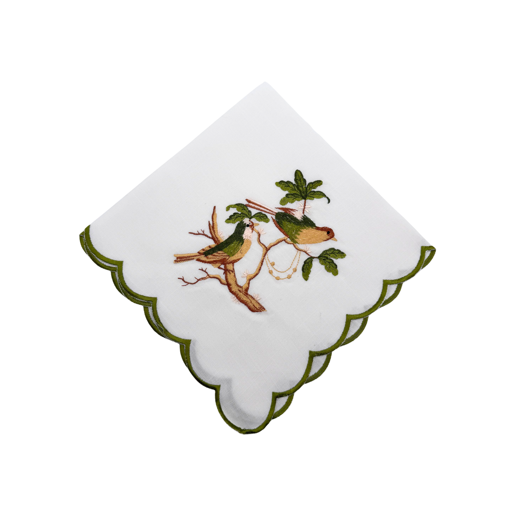 Decorative napkin with bird design on a white background