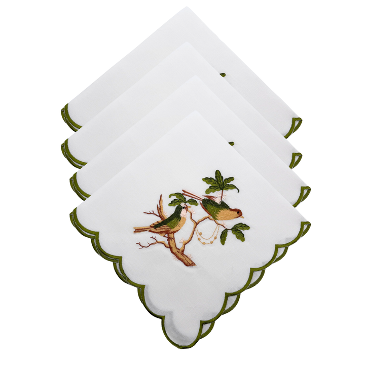 Set of white napkins with bird design on a white background