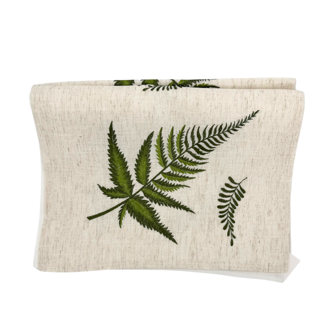 table runner in natural color featuring embroidered ferns