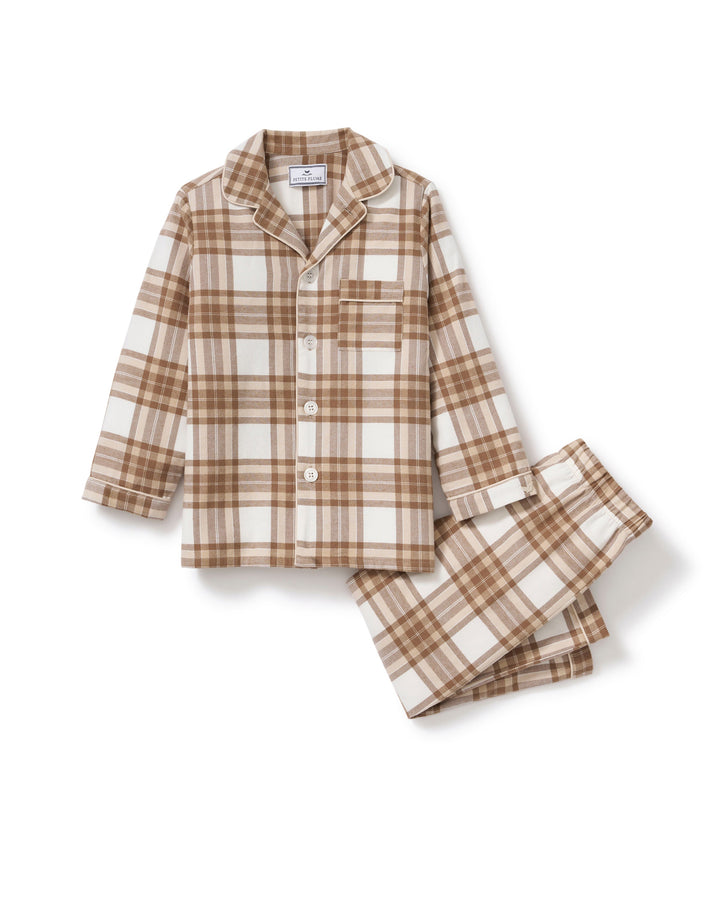 A two-piece children's pajama set featuring a long-sleeve button-up shirt and matching pants in a brown and cream plaid pattern, displayed on a clean white background.
