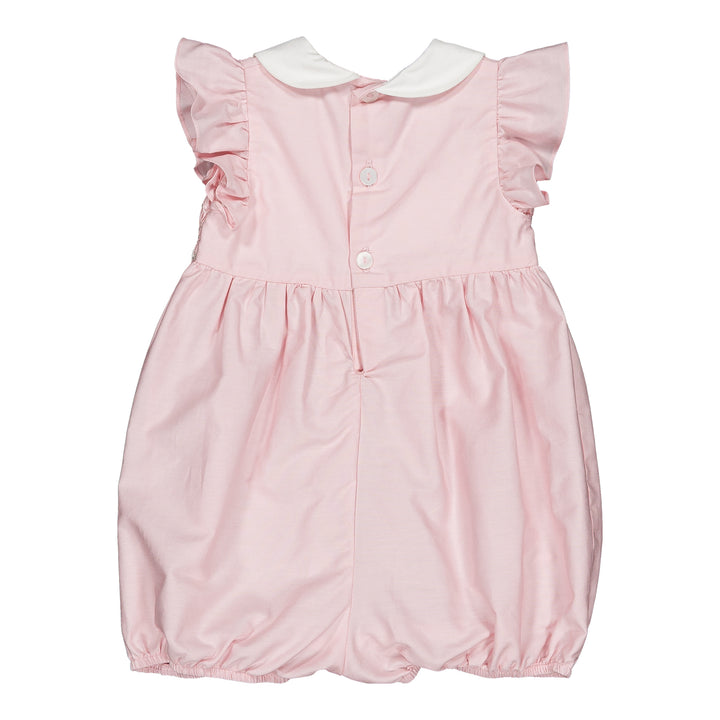 Pink baby romper with white collar on a white background