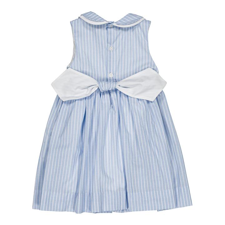 Blue and white striped dress with a large bow on a white background