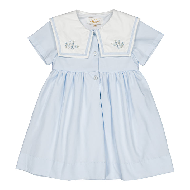 Light blue dress with white collar and embroidery on a white background