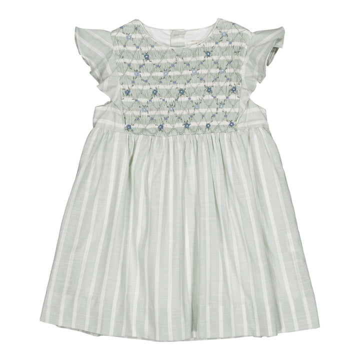 White dress with floral smocking on a white background